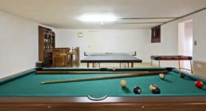 54181,Pool table and ping pong table in basement