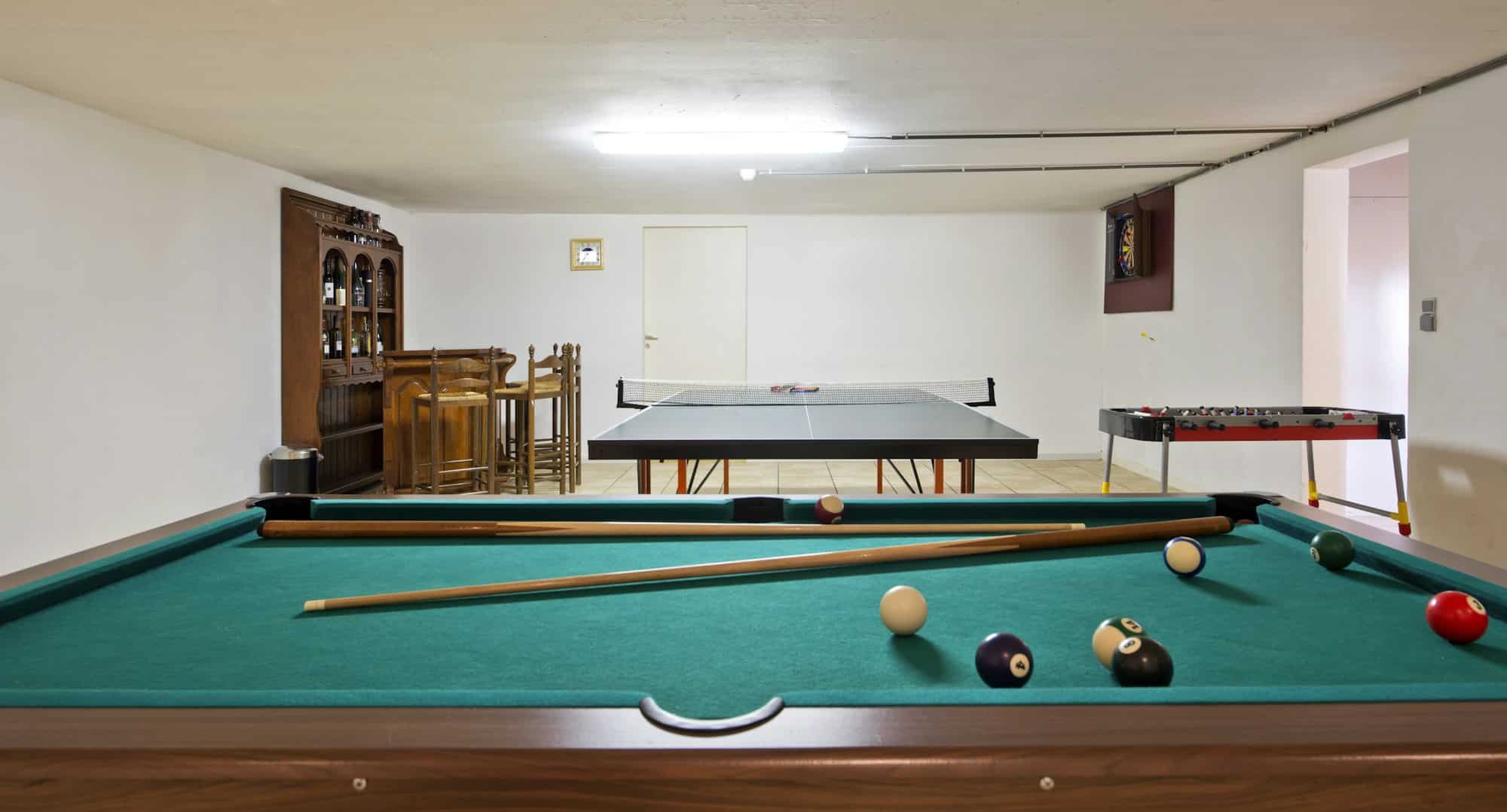 54181,Pool table and ping pong table in basement