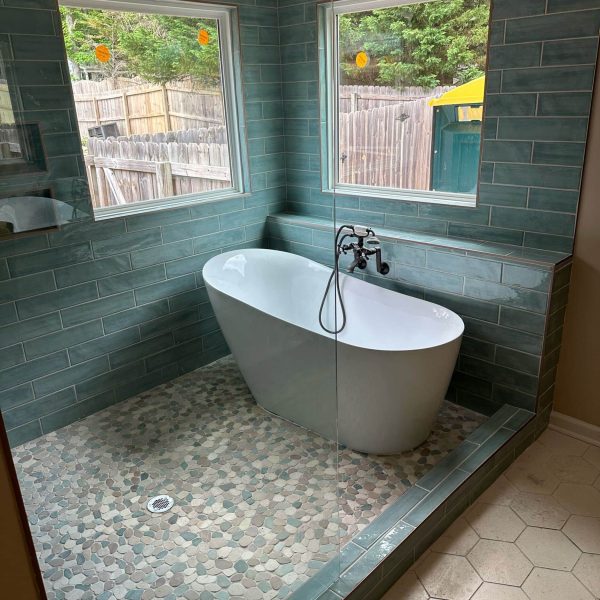Bathroom remodel with freestanding soaking tub by JCG in West Georgia
