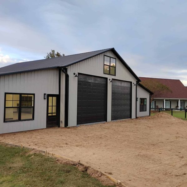 Custom barndominium with modern farmhouse design built by JCG in West Georgia